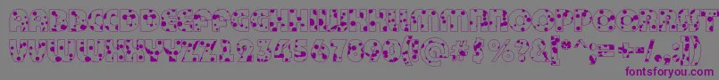 Czcionka BighaustitulotldrRegular – fioletowe czcionki na szarym tle