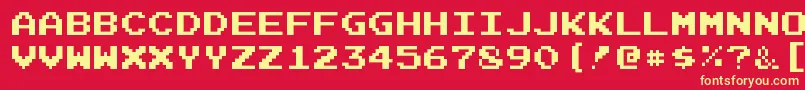 JoystixmonospaceRegular-Schriftart – Gelbe Schriften auf rotem Hintergrund