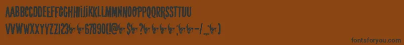 フォントDkCrypt – 黒い文字が茶色の背景にあります