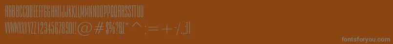 Czcionka Empiren – szare czcionki na brązowym tle