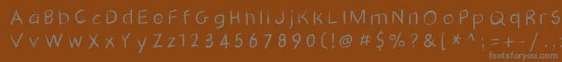 Gridscribblesswinging Font – Gray Fonts on Brown Background