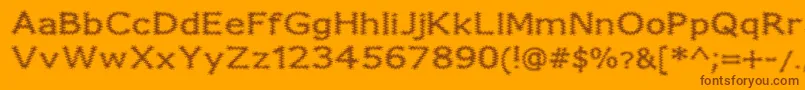 FuzzyXmas Font – Brown Fonts on Orange Background