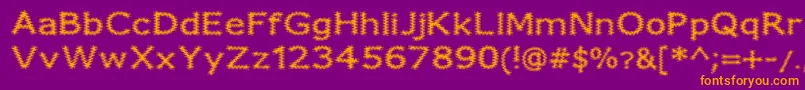 FuzzyXmas Font – Orange Fonts on Purple Background