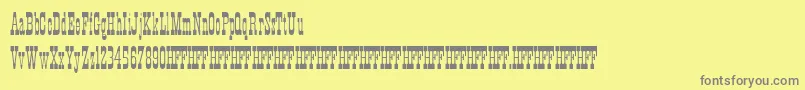 フォントHffXmasHoedown – 黄色の背景に灰色の文字