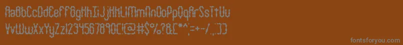 Wigsquig Font – Gray Fonts on Brown Background