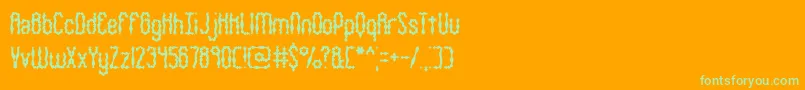 Wigsquig-Schriftart – Grüne Schriften auf orangefarbenem Hintergrund