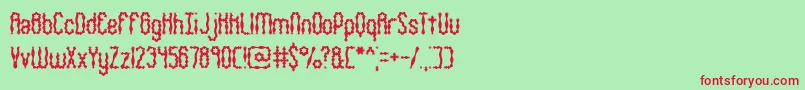 Wigsquig-Schriftart – Rote Schriften auf grünem Hintergrund