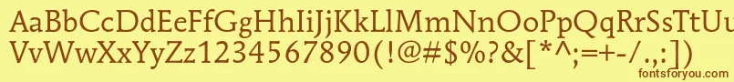 フォントMendozaromanstdBook – 茶色の文字が黄色の背景にあります。
