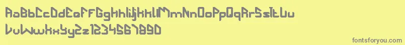 TheFuturist-Schriftart – Graue Schriften auf gelbem Hintergrund