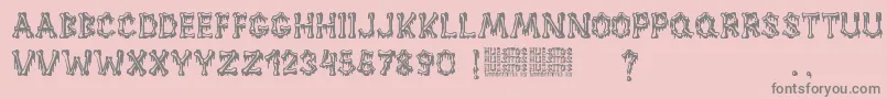 Huesitos Font – Gray Fonts on Pink Background