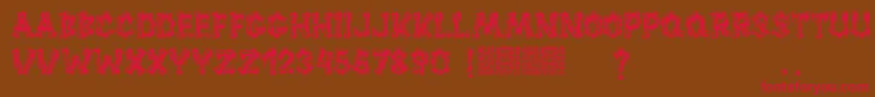 Huesitos Font – Red Fonts on Brown Background