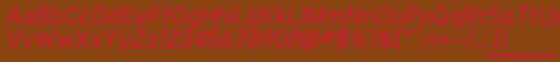 KlimaRegularItalic Font – Red Fonts on Brown Background
