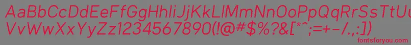 フォントKlimaRegularItalic – 赤い文字の灰色の背景