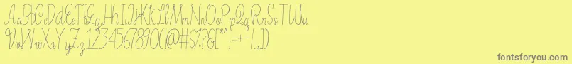 Erica-Schriftart – Graue Schriften auf gelbem Hintergrund