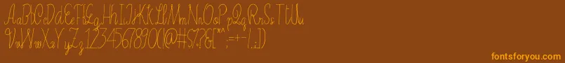 Erica Font – Orange Fonts on Brown Background