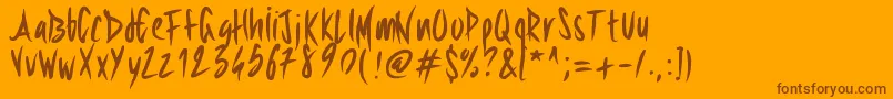 Pwsharpbrush-fontti – ruskeat fontit oranssilla taustalla