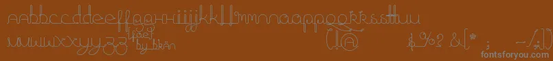 フォントFragmentsOfEter – 茶色の背景に灰色の文字