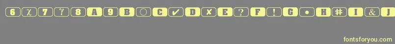 Bullets1-fontti – keltaiset fontit harmaalla taustalla