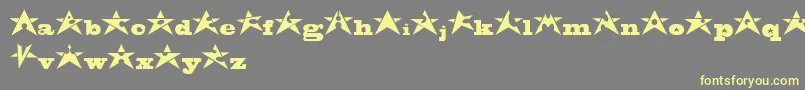 Czcionka AdrianStars – żółte czcionki na szarym tle