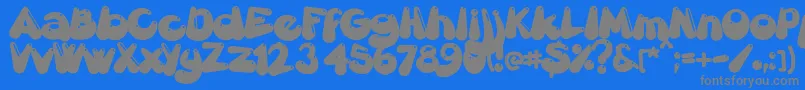 フォントGretoonhighlight – 青い背景に灰色の文字