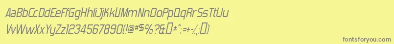 ForgottenFuturistItalic-fontti – harmaat kirjasimet keltaisella taustalla