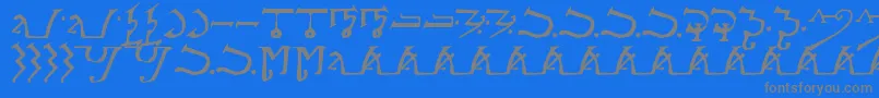 AlphabetOfTheMagi Font – Gray Fonts on Blue Background