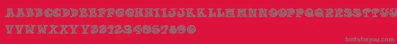 Doodletters-fontti – harmaat kirjasimet punaisella taustalla
