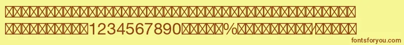 フォントHelveticaltstdFractions – 茶色の文字が黄色の背景にあります。