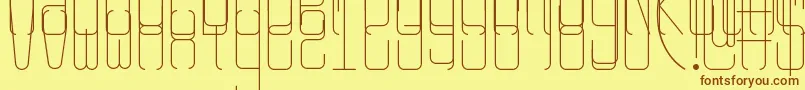 フォントRangy – 茶色の文字が黄色の背景にあります。
