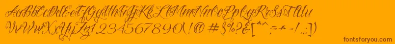 Fonte VtcNuetattooscript – fontes marrons em um fundo laranja