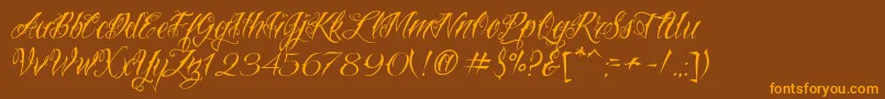 VtcNuetattooscript-Schriftart – Orangefarbene Schriften auf braunem Hintergrund