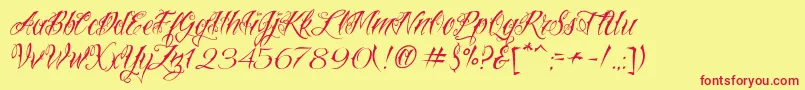 VtcNuetattooscript-Schriftart – Rote Schriften auf gelbem Hintergrund