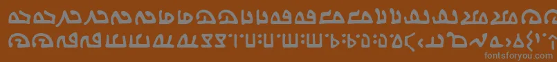 フォントWecomeinpeacebbReg – 茶色の背景に灰色の文字