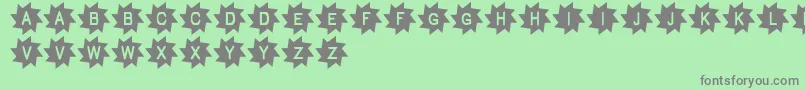 Pukisaka Font – Gray Fonts on Green Background