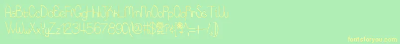 Littlemisspriss Font – Yellow Fonts on Green Background