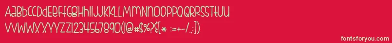 BmdFishfingers-Schriftart – Grüne Schriften auf rotem Hintergrund