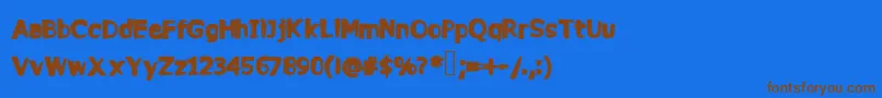 Commy Font – Brown Fonts on Blue Background