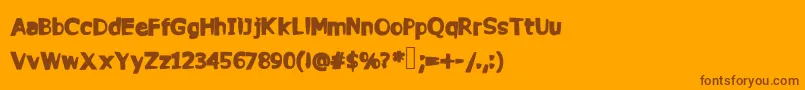 Police Commy – polices brunes sur fond orange