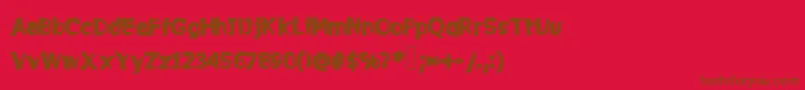 フォントCommy – 赤い背景に茶色の文字