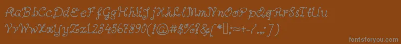 Abutterflyonadaffodil Font – Gray Fonts on Brown Background