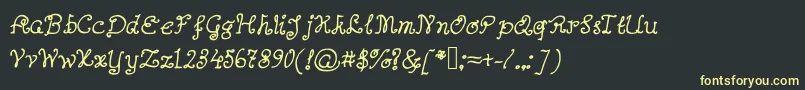 Abutterflyonadaffodil Font – Yellow Fonts on Black Background
