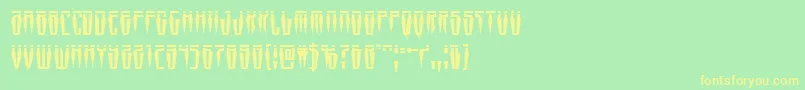 Swordtoothlaser-Schriftart – Gelbe Schriften auf grünem Hintergrund