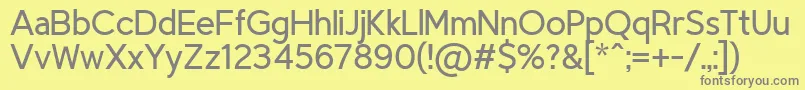 TriompheLight-Schriftart – Graue Schriften auf gelbem Hintergrund