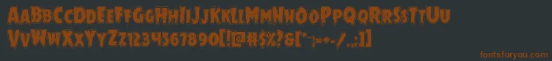 Mrsmonsteracad-Schriftart – Braune Schriften auf schwarzem Hintergrund