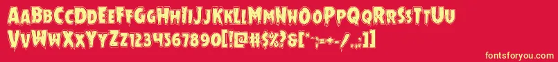 フォントMrsmonsteracad – 黄色の文字、赤い背景