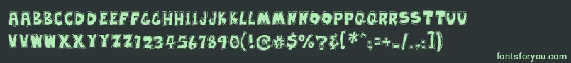 EarwaxWit Font – Green Fonts on Black Background