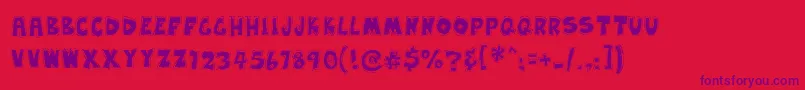 EarwaxWit Font – Purple Fonts on Red Background