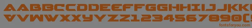 フォントGemina2expand – 茶色の文字が灰色の背景にあります。