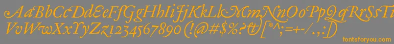 フォントAntiqueAncienneItalic – オレンジの文字は灰色の背景にあります。