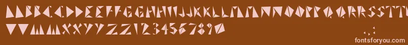 フォントTrinistaGrf – 茶色の背景にピンクのフォント